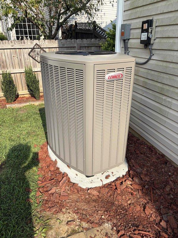 Completed full HVAC system replacement including removal of existing equipment and installation of new Lennox Elite 4-ton air conditioning condenser (EL18KCV-048), CK40 4-ton evaporator coil, and Signature Series 90,000 BTU furnace (SL280V-90). Installed new outdoor condenser pad and positioned unit on concrete base with proper clearances. Replaced existing zoning system ductwork to accommodate new equipment specifications. Installed Lennox E40 programmable thermostat for system control and monitoring. Added Aprilaire 1110 media air cleaner with MERV 11 filtration and TRADEPRO germicidal UVC light kit for enhanced indoor air quality. Installed float switches for condensate overflow protection. Performed complete system startup, verified proper refrigerant charge, airflow measurements, and operational testing of all components. Confirmed heating and cooling cycles functioning within manufacturer specifications. All electrical connections secured to code with proper disconnect box instal