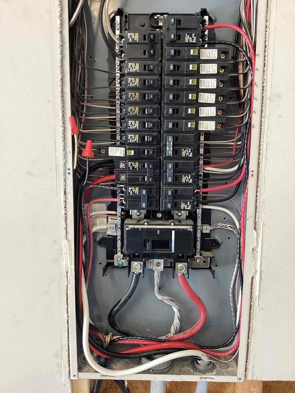 Installed generator power inlet box on exterior of residential property built in 2015. Ran PVC conduit from main electrical panel to new inlet box location on exterior wall near existing meter and service equipment. Made necessary connections at main panel to accommodate generator transfer capability. Verified all electrical connections were secure and installation met code requirements for generator hookup systems.