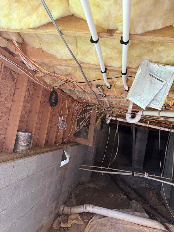 Installed three dedicated electrical circuits from the main panel: two circuits routed through exposed conduit to the upstairs bedroom for red light therapy panels, and one circuit for a primary bedroom air conditioning unit. Coordinated permit acquisition and scheduled inspection with the local jurisdiction. All installation work includes a comprehensive parts and labor warranty.