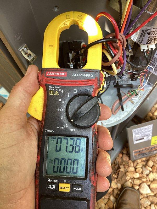 Responded to no cooling call on 1-year-old system with thermostat not powering on following power outage. Upon inspection, tested electrical components using clamp meter and found capacitor reading 3444 μF, indicating failed run capacitor causing system shutdown. Measured current draw at 7.50A on blower motor circuit and verified all electrical connections at control board and gas valve assembly, replaced defective capacitor, restored power to thermostat and system, and confirmed proper operation of cooling cycle.