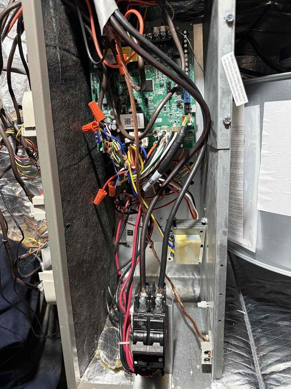 Installed dedicated electrical circuits for HVAC system components, running #10 wire from the main panel to supply power to the outdoor condensing unit and air handler located in the crawl space. Mounted junction box in attic space with proper support on structural framing, routed wiring through insulated areas following code requirements, and completed all terminations at the air handler control board with appropriate wire management and overcurrent protection devices.