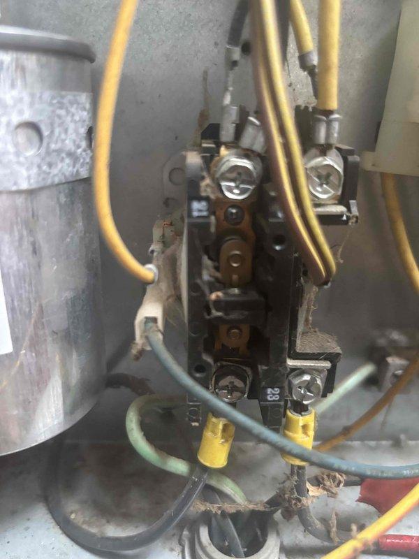 Completed HVAC component replacements on a residential system to address multiple failure points. Replaced the main level condensate pump to prevent water overflow and potential property damage. Installed a new outdoor contactor on the main level unit after identifying severe burning and pitting on the original component, which posed a fire hazard and operational failure risk. Replaced the basement blower motor capacitor, which tested at 2.3 µF against its 5 µF rating, indicating significant degradation that would have led to blower motor failure. All replacement parts were installed per manufacturer specifications with proper electrical connections verified. System tested and confirmed operational following repairs.