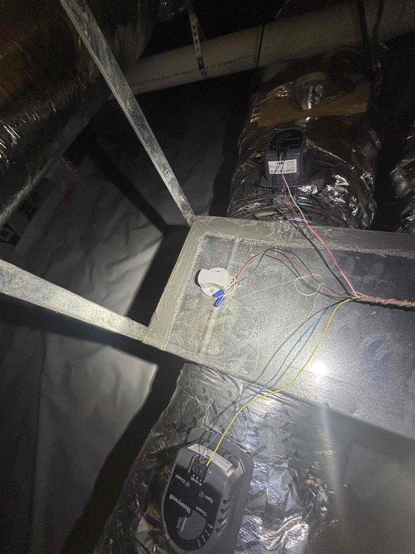 Responded to no cooling complaint on 2019 residential AC system with thermostat indicating possible compressor failure. Upon arrival, performed comprehensive system diagnostics including electrical testing at control panel using digital multimeter, which revealed voltage reading of 250.7V. Accessed attic-mounted air handler and ductwork to inspect system components, wiring connections, and operational status. Evaluated compressor functionality, refrigerant circuit, and all electrical connections throughout the system. Documented equipment conditions and electrical measurements to determine root cause of cooling failure and provided homeowner with repair options and recommendations to restore system operation.