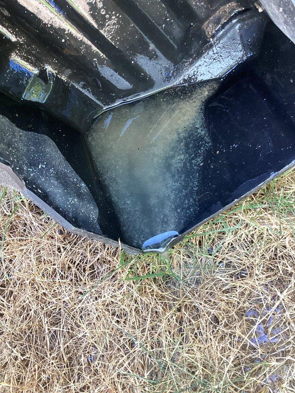 Responded to service call for thermostat malfunction causing cooling system to stop functioning between 7 PM and 3 AM for approximately one week. Performed diagnostic testing of 10-year-old HVAC system, including static pressure measurements which registered 0.49 inches with filters installed. Inspected condensate drain system and found standing water in drain pan, indicating potential blockage affecting system operation. Cleared condensate line obstruction and verified proper drainage to restore normal system cycling and eliminate time-specific cooling interruption.