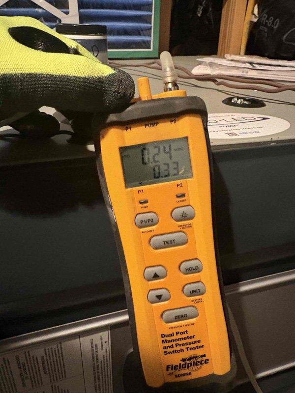Performed comprehensive system evaluation on two HVAC units (4-year-old upstairs system and 10-year-old system) at customer's request for second opinion. Conducted diagnostic testing using dual port manometer to measure static pressure readings across both systems, verifying airflow performance and system operation. Documented findings with diagnostic measurements and visual inspection of equipment components.