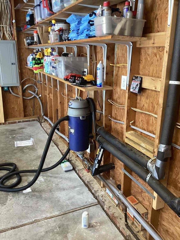 Relocated existing EV charger to opposite side of garage, including disconnection from original location, running new dedicated circuit wiring through wall cavities, mounting charger unit on plywood backing secured to wall studs, and verifying proper operation with green indicator light functioning. Installed three new 120V outlets on rear patio area, running appropriate gauge wiring from electrical panel, mounting weather-resistant boxes and receptacles, and testing all circuits for proper voltage and grounding. All work completed to code with proper wire management and secure mounting of all electrical components.