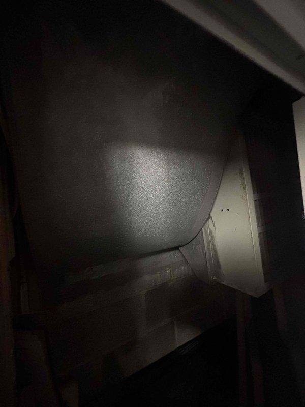 Responded to service call for multi-point system evaluation on 2021 HVAC system. Investigated reported allergic reaction concerns in basement area by conducting moisture inspection and visual mold assessment of ductwork and ventilation components. Removed basement register to access and inspect flexible ductwork for potential contamination, debris accumulation, or moisture intrusion. Documented interior duct conditions with photographic evidence showing flexible ducting connection points and interior pathway.

Addressed thermostat discrepancy where upstairs zone displayed 81 degrees despite 73-degree setpoint. Performed diagnostic testing to determine actual ambient temperature versus displayed reading and evaluated thermostat calibration and system response. Assessed cooling system performance and airflow delivery to second floor to identify cause of temperature differential.

Conducted comprehensive system walkthrough and airflow evaluation per homeowner request. Inspected return air