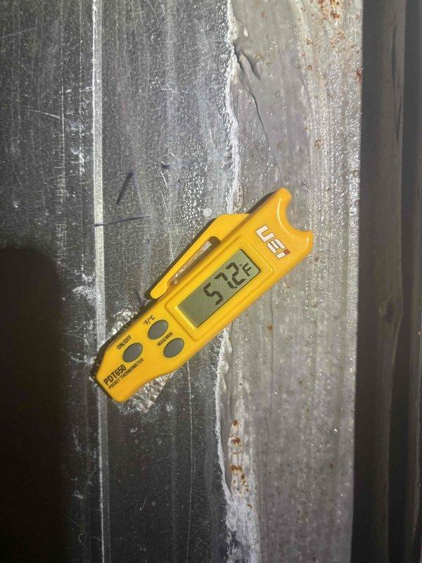 Responded to pre-sale home inspection concern regarding condensation near HVAC unit in crawlspace. Performed thorough system inspection of 2020 Coleman unit, checked condensate drain lines for proper flow and drainage, and verified all PVC drain routing was functioning correctly. Documented temperature readings and confirmed unit operating within normal parameters with no active moisture issues or drainage problems present at time of inspection.
