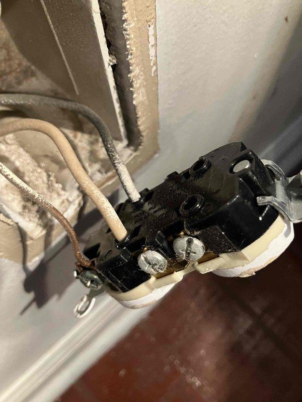Responded to electrical issue in living room where TV outlet failed causing connected devices to lose power, including fireplace. Inspected electrical panel and verified breaker operation. Diagnosed and addressed secondary outlet with obstructed receptacle preventing plug insertion.