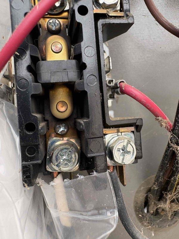 Responded to no cooling complaint on 2019 HVAC system that had been struggling to maintain temperature for several days before losing airflow completely. Upon arrival, performed diagnostic inspection of indoor air handler and outdoor condensing unit. Inspected electrical connections at outdoor disconnect, noting worn wiring and potential loose connections at brass terminals that could cause intermittent power loss to compressor. Examined ductwork and air handler components in attic space for airflow restrictions or mechanical failures. Verified system operation, checked refrigerant pressures, and assessed blower motor function to determine root cause of inadequate cooling and reduced airflow.