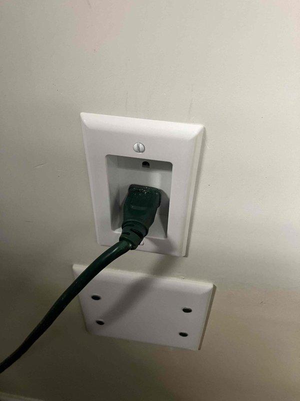 Completed annual 32-point electrical system evaluation including comprehensive electrical panel maintenance with torque verification and connection inspection of all breakers and bus bars. Performed GFCI outlet and breaker testing to verify proper shock protection functionality, along with arc fault breaker testing to ensure fire protection systems operating correctly. Conducted smoke and carbon monoxide detector maintenance including battery replacement and operational testing. Addressed reported concern regarding garage outlet pushed back into wall cavity; inspected recessed outlet installation and verified secure mounting and proper electrical connections. Inspected exterior electrical service equipment including main panel, meter base, and backup generator transfer equipment. Provided customer-supplied light bulb replacement service for fixtures up to 12 feet and performed ceiling fan cleaning service. All electrical systems tested and confirmed operational, with panel connections 
