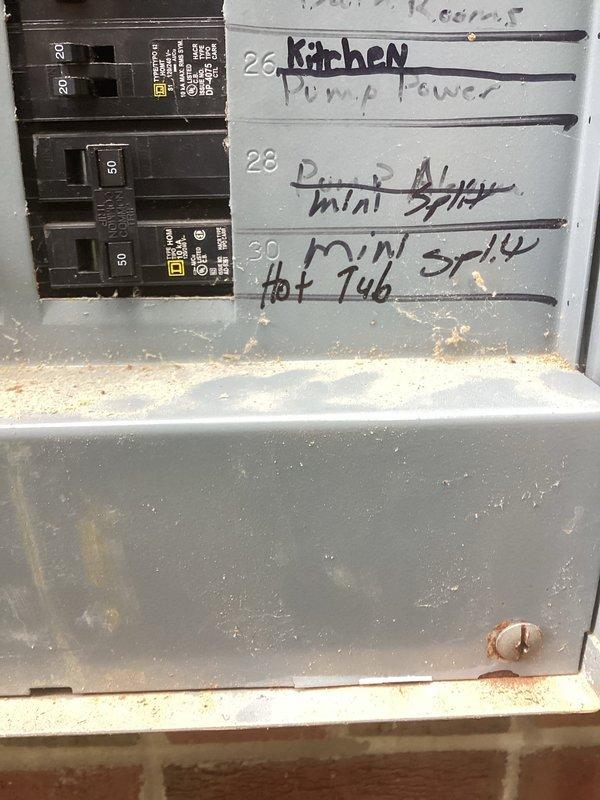 Responded to service call for malfunctioning mini split system on second floor above garage. Inspected 2007 unit and associated electrical connections at breaker panel, documenting circuit configurations and wiring conditions. Provided diagnostic assessment of existing system issues and presented options for repair versus replacement of aging equipment.