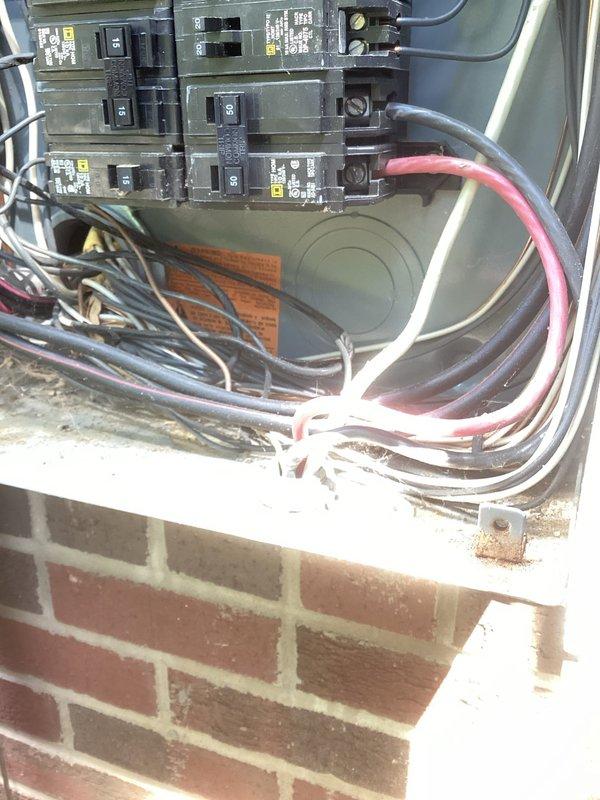 Responded to service call for malfunctioning mini split system on second floor above garage. Inspected 2007 unit and associated electrical connections at breaker panel, documenting circuit configurations and wiring conditions. Provided diagnostic assessment of existing system issues and presented options for repair versus replacement of aging equipment.
