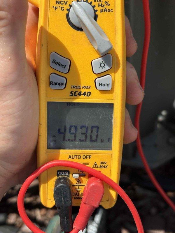 Responded to no cooling complaint on 5-year-old air conditioning system. Performed diagnostic testing using digital multimeter to check electrical components and voltage readings. Accessed interior components through ceiling panel to inspect refrigerant lines and electrical connections, identifying issue preventing proper system operation.