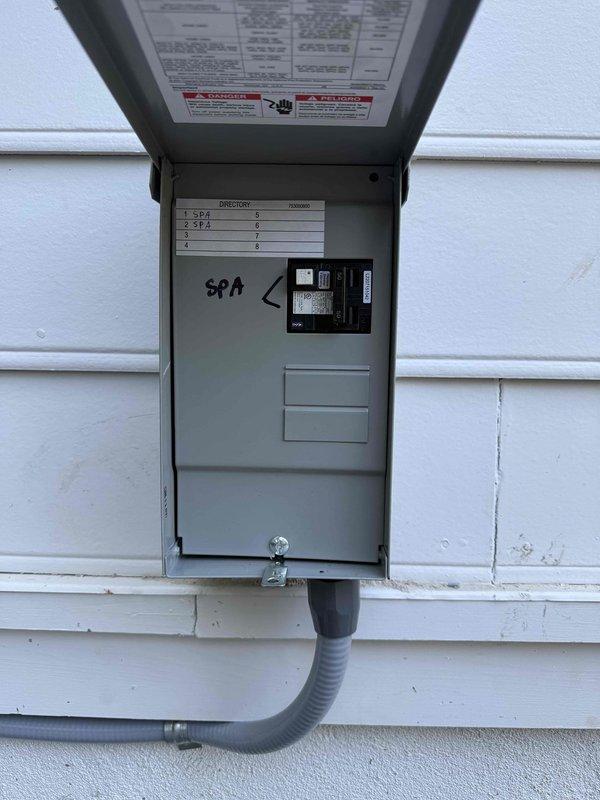 Installed a dedicated 60-amp circuit for hot tub with exterior disconnect box, established code-compliant equipotential bonding around the hot tub and bonded all metal components within 5 feet of water's edge, and completed hard-wired connection to the spa equipment. Replaced attic fan motor and thermostat assembly, ensuring proper electrical connections to the control board. Extended existing garage outlet to accommodate new garage organizer system, and obtained all required electrical permits for the installation.
