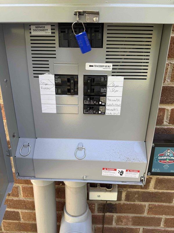 Responded to possible recall for non-functioning 120-volt exterior outlet installed during previous service upgrade. Upon arrival, tested outlet with Klein RT250 GFCI tester which displayed 122 VAC and "CORRECT" reading, confirming proper voltage and functionality. Provided customer education on locating the appropriate circuit breaker in the recently installed 200-amp service panel and explained panel operation procedures for future reference.