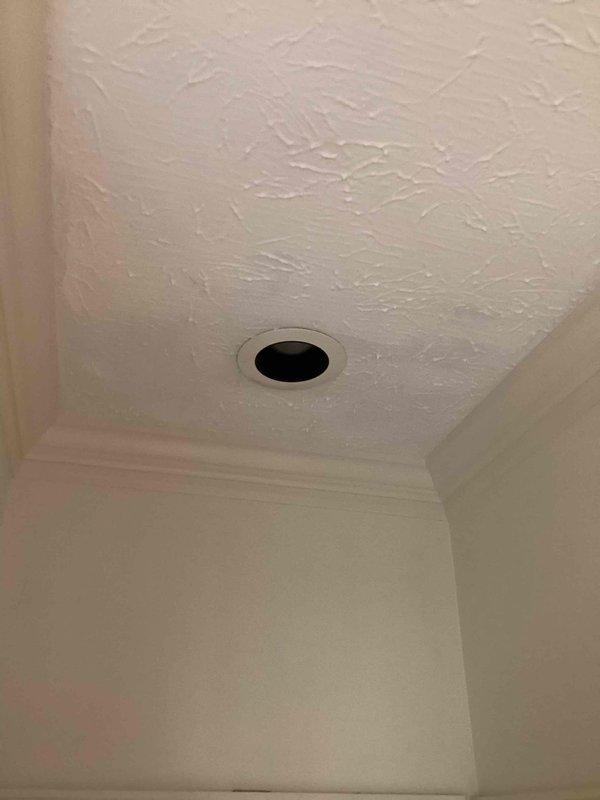 Installed two premium six-inch recessed light trims in the downstairs hallway ceiling. Both fixtures were properly secured with trim rings and tested for proper illumination upon completion.