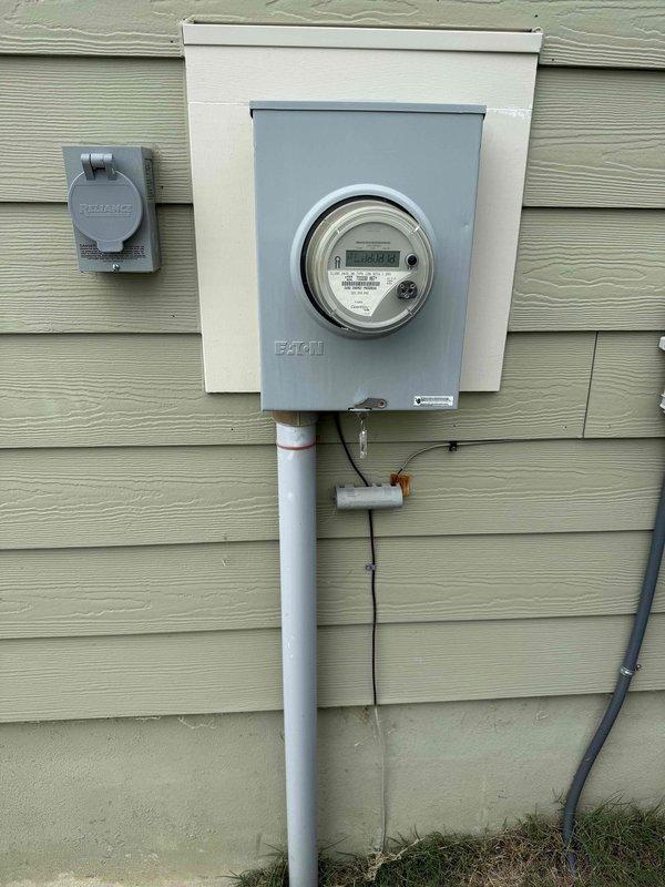 Responded to HVAC maintenance visit follow-up to evaluate reported electrical breaker concern. Conducted thorough inspection of exterior electrical service panel, meter installation, and associated HVAC system electrical connections. Examined Eaton meter box, weatherproof enclosures, conduit runs, and grounding systems at exterior service location. Inspected interior HVAC unit electrical control panel, verified all wire terminations, control board connections, and blower motor electrical components. All electrical breakers, connections, and circuits found to be functioning properly with no deficiencies identified. Documented installation condition with photographs for service records.