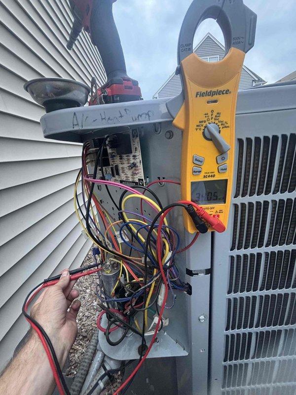 Completed comprehensive tune-up on 3-year-old residential air conditioning system. Performed electrical diagnostics using clamp meter to verify amperage draws and voltage readings at contactor and control panel, confirming all components operating within manufacturer specifications. Inspected wiring connections, tested capacitor functionality, and verified proper system operation with all readings normal.