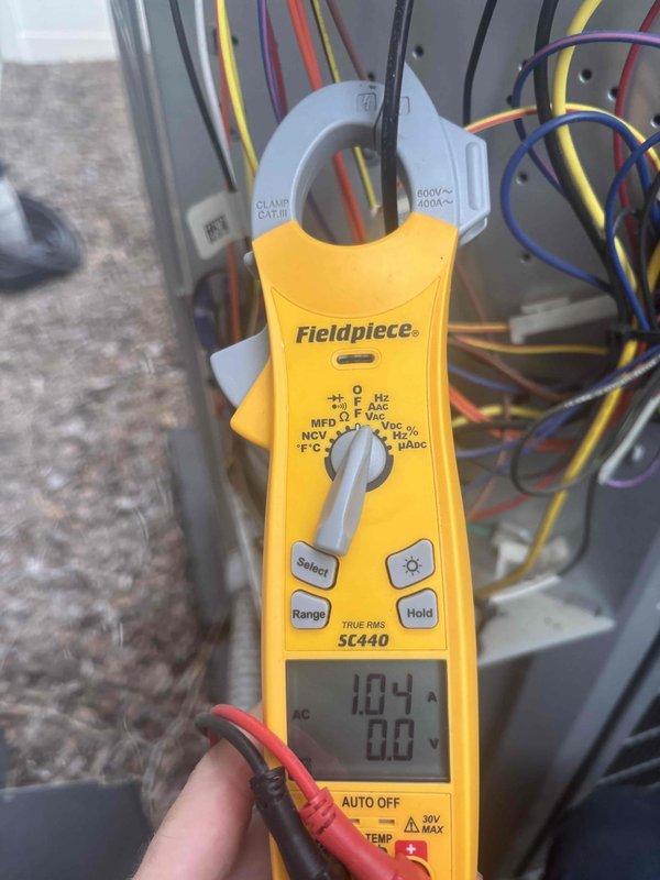 Completed comprehensive tune-up on 3-year-old residential air conditioning system. Performed electrical diagnostics using clamp meter to verify amperage draws and voltage readings at contactor and control panel, confirming all components operating within manufacturer specifications. Inspected wiring connections, tested capacitor functionality, and verified proper system operation with all readings normal.