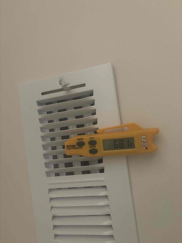 Responded to no cooling call where customer reported no air flow from vents and rising indoor temperatures. Upon arrival, found HZ311 multi-zone control board had been shut down by customer via thermostat. Inspected zone controller and verified proper wiring connections at terminal blocks, checked LED zone indicators for operational status, and measured supply air temperature at register reading 68.8°F. Restored system operation and confirmed airflow to affected zones.