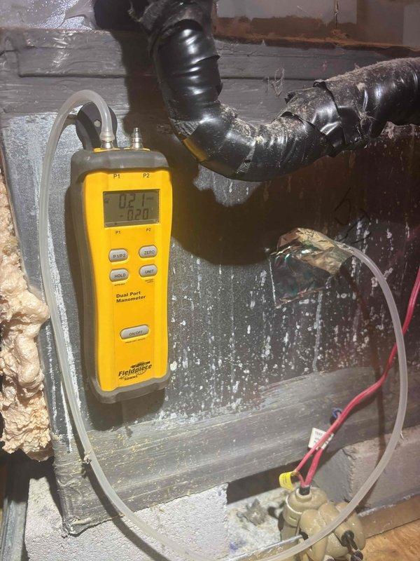 Replaced the fresh air damper motor on the HVAC system. Verified proper operation and took temperature measurements to confirm system functionality, with readings showing appropriate airflow and temperature differential across the unit.