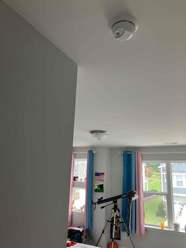 Completed installation of three ceiling fans with integrated lighting fixtures in new construction residential property. All units were mounted to pre-existing fan-rated junction boxes at 8-9 foot ceiling heights with electrical wiring already in place. Verified proper electrical connections, tested fan operation at all speed settings, confirmed light fixture functionality, and ensured secure mounting and blade balance on all three installations.