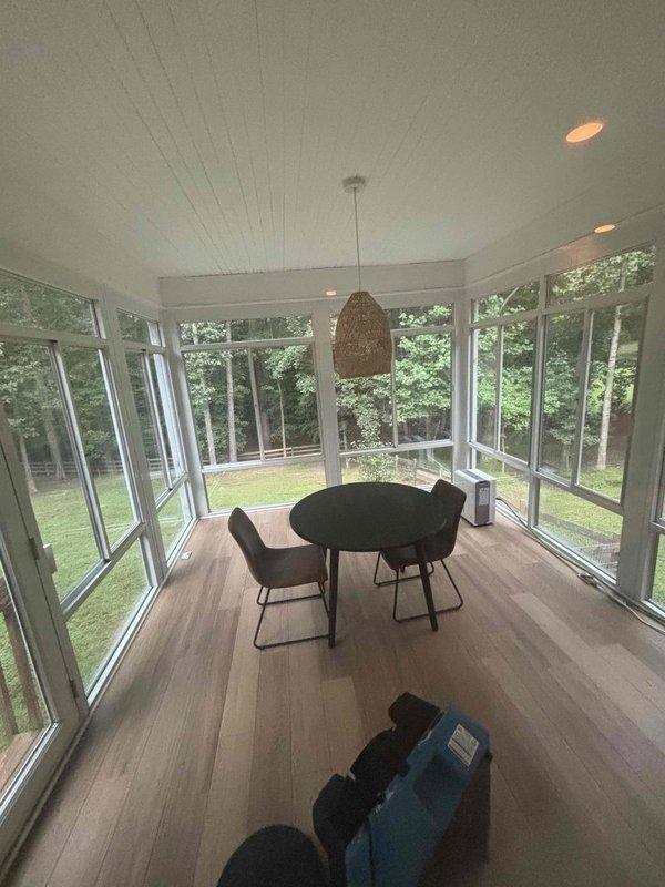 Responded to request for ductwork installation to enclosed sunroom. Homeowner had previously removed moldy PTAC unit and requested conditioned air be extended to the space. Assessed sunroom layout, existing HVAC system capacity, and electrical panel configuration to determine feasibility of running supply duct from main system. Provided recommendations and estimate for ductwork installation to restore climate control to the three-season room.