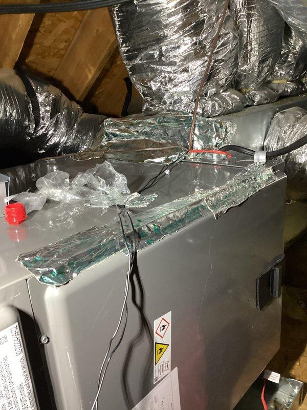 Responded to service callback for blank thermostat display on unit installed earlier in the week. Inspected thermostat wiring and power supply, verified air handler operation in attic, and documented system configuration. Resolved thermostat issue and restored normal system operation.