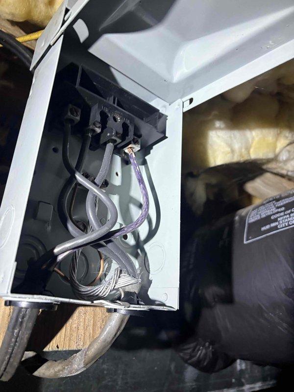 Responded to service call for HVAC system not cooling and running continuously. Upon arrival, accessed attic-mounted air handler and inspected electrical control box, wiring connections, and internal components. Unit was found in off position at thermostat at time of inspection. Documented equipment condition with photos of control box interior showing wiring configuration and heat strip components for further evaluation and potential recall verification.
