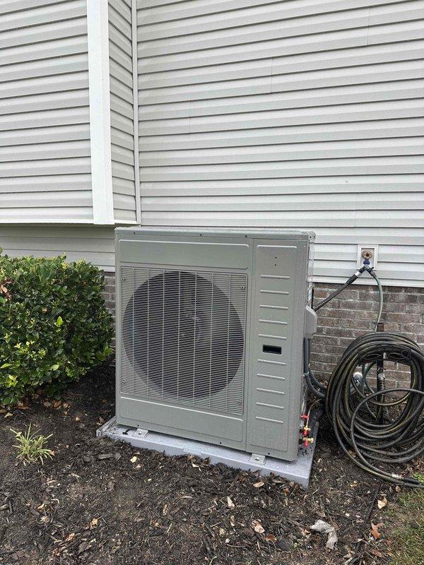 Completed full HVAC system replacement including removal of existing equipment and installation of Rheem RD18AY36AJVCA 3-ton 18 SEER2 variable-speed heat pump condenser with R-454B refrigerant on new outdoor pad, paired with Rheem RH2VY3617STACNJ 3-ton multi-position air handler with 2-stage operation installed in attic space with custom wooden framework. Integrated Tutco 8kW electric heat kit, installed float switches for condensate protection, and completed flexible ductwork connections with proper insulation and securing. Added Ecobee Smart Wi-Fi thermostat with remote sensor and built-in voice control capability, plus TRADEPRO germicidal UVC light kit for enhanced air quality. Performed complete system startup, verified refrigerant charge, tested all electrical connections at 208-230V/1/60Hz, confirmed proper airflow and staging operation across both heating and cooling modes. Disposed of all old equipment through recycling protocols, maintained clean work area throughout installat