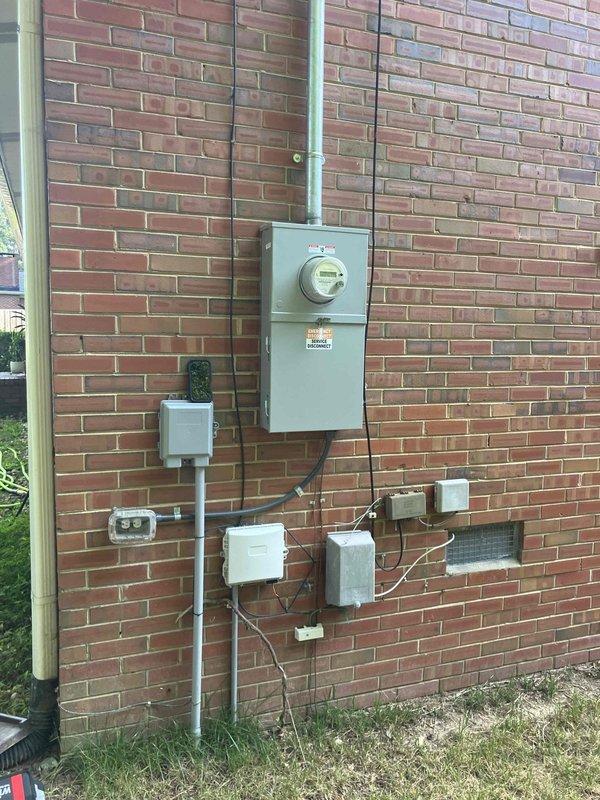 Completed comprehensive annual 32-point electrical system evaluation including preventive maintenance on main electrical panel with connection torquing and inspection. Performed GFCI outlet and breaker testing to verify shock protection functionality, arc fault breaker testing to confirm fire protection systems operating properly, and smoke and CO2 detector maintenance with battery replacement and operational testing. Replaced customer-supplied light bulbs in fixtures up to 12 feet and cleaned ceiling fans up to 12 feet. All electrical components inspected and found functioning within normal parameters.