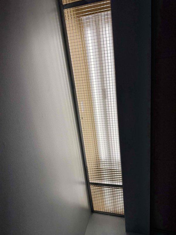 Responded to lighting outage in two rooms of commercial facility. Troubleshot and replaced non-functioning fluorescent light fixtures in the Ducklings room and Robin's room, working at 8-foot ceiling height using ladder. Verified all lighting circuits operational and restored full illumination to both areas upon completion.
