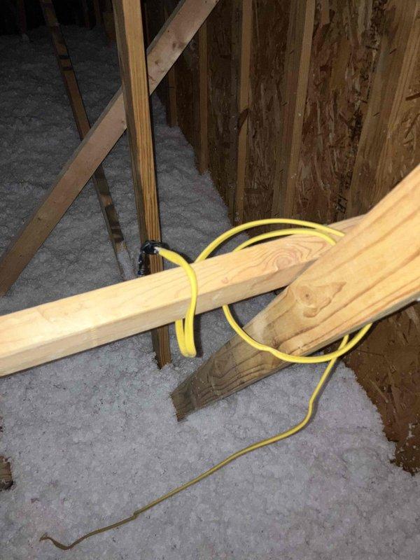 Installed dedicated electrical circuit for new HVAC system using appropriate gauge wiring routed through exposed framing to equipment location. Completed all electrical connections at unit with proper wire terminations and verified system readiness for HVAC startup.