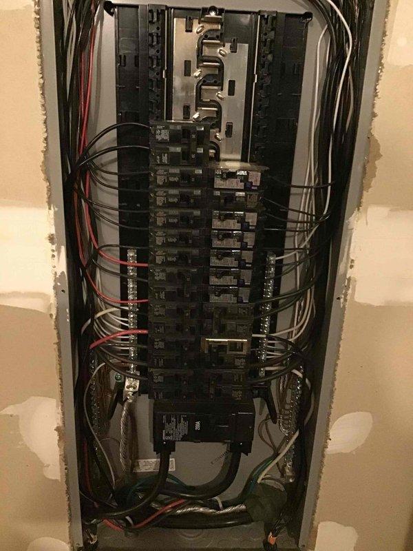 Completed comprehensive 32-point annual electrical system evaluation including electrical panel maintenance with proper torquing and connection verification of all circuit breakers and bus bar connections. Performed GFCI outlet and breaker testing to confirm shock protection functionality, and conducted arc fault breaker testing to ensure fire protection systems operating correctly. Executed smoke and carbon monoxide detector maintenance including battery replacement and operational testing. Provided customer-supplied light bulb replacement service for fixtures up to 12 feet and ceiling fan cleaning for units up to 12 feet. All electrical systems tested and verified to be functioning within normal parameters.