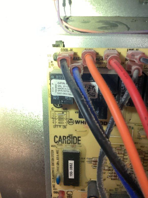 Responded to service call for reported condensation pump line issue on 15-year-old system. Performed diagnostic evaluation of HVAC unit including static pressure measurements at return air, recording 0.18" reading with Testo 510 differential pressure meter. Inspected White Rodgers control board (model 2580-931) and verified proper wiring connections and system controls for heating and cooling operations.