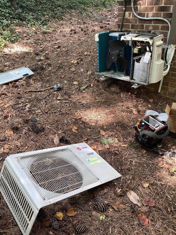 Replaced condenser fan motor under parts warranty on Mitsubishi Electric split-system heat pump unit (Model: NTXSKS08A112AA). Removed outdoor condenser access panel, disconnected failed motor, installed replacement motor, verified proper electrical connections, and tested system operation. Unit running within manufacturer specifications upon completion with proper airflow and cooling performance restored.