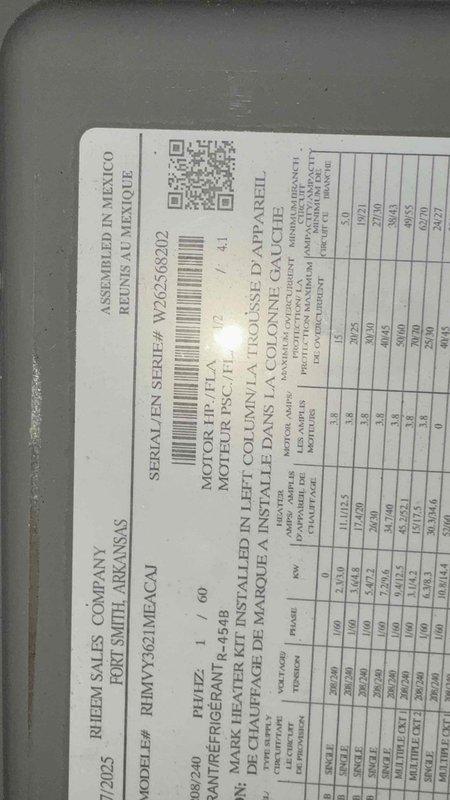 Responded to rental property for possible recall inspection on system installed in 2022. Upon arrival, confirmed unit was not operating. Performed complete heating and air check including 80-point inspection, outdoor coil cleaning, burner cleaning, gas pressure adjustments, and comprehensive safety inspections. Diagnostic testing with multimeter confirmed electrical readings, and verified equipment specifications on unit nameplate (Model RHEMV3621MECU1, Serial V2C2958202).