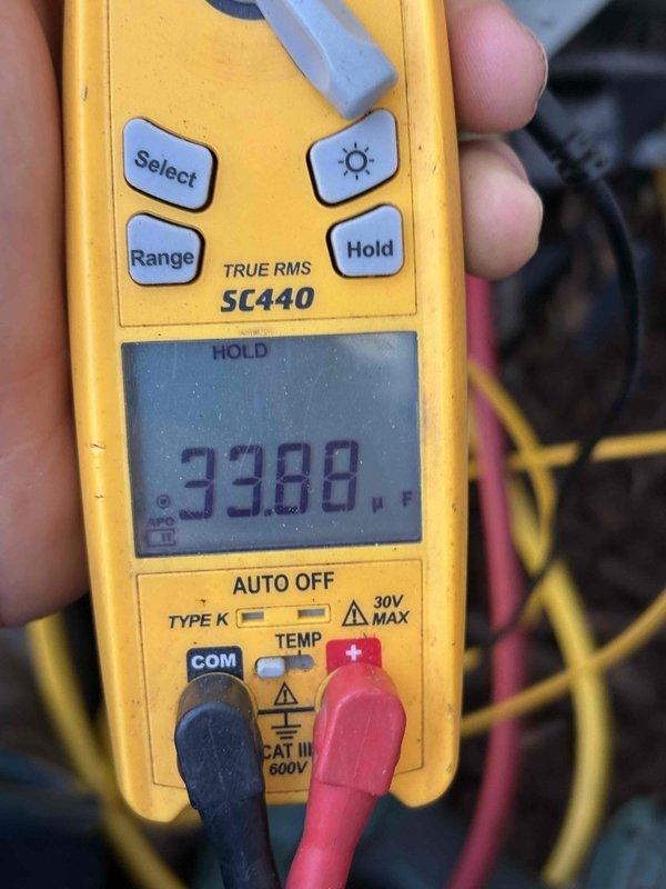 Responded to no cooling complaint on five-year-old upstairs air conditioning system with reported temperature differential between floors and uneven room temperatures. Upon arrival, performed comprehensive system evaluation including electrical diagnostics using digital multimeter to verify voltage and amperage readings at the unit. Measured system performance parameters and assessed airflow distribution issues, noting customer concerns regarding inadequate air delivery to specific rooms. Conducted ductwork inspection to identify potential restrictions or leakage affecting cooling capacity and air distribution throughout the upstairs zone.