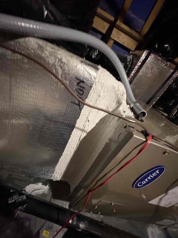 Responded to attic service call regarding condensation and water accumulation around air handler unit. Inspected 2024 Carrier air handler and associated ductwork connections for air seal integrity. Resealed all penetrations and connections on the AC unit to prevent moisture intrusion and ensure proper environmental separation between conditioned and unconditioned spaces.