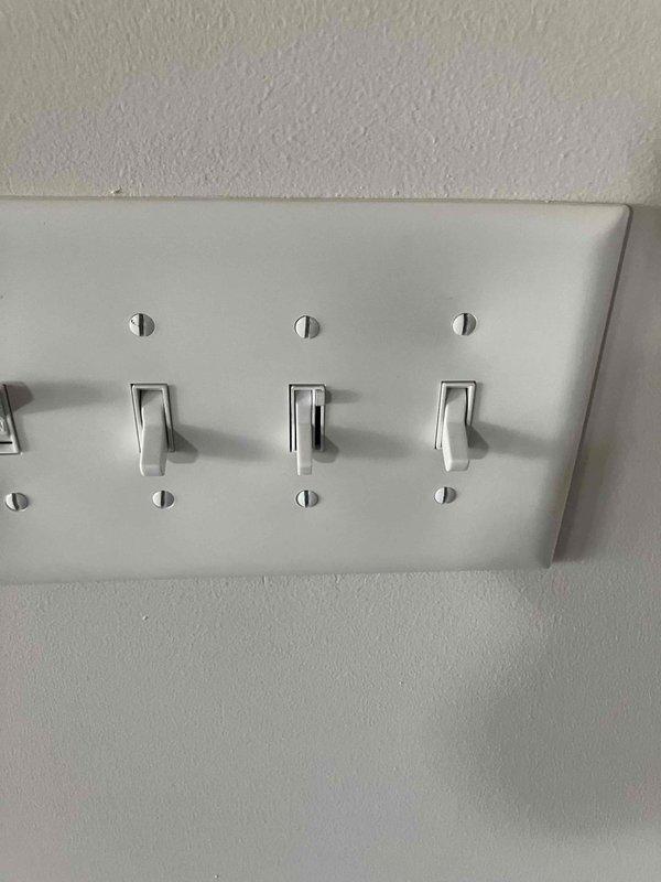 Completed comprehensive electrical upgrade including installation of new LED wafer recessed lighting fixtures throughout the interior of the residence, with multiple units installed in the kitchen area as evidenced by the flush-mounted circular fixtures with white trim rings. Installed whole home surge protection device at the main electrical panel to safeguard all household circuits and electronics from voltage spikes and power surges. Additionally, installed dedicated equipment surge protector for the air conditioning unit to protect HVAC system from electrical damage. All installations performed to current NEC standards with proper circuit connections and grounding, and all work covered under warranty.