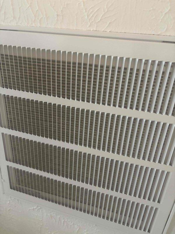 Responded to no cool call on 16-year-old system not maintaining setpoint, running 2 degrees above thermostat setting of 76°F. Performed system inspection including blower assembly and return air grille. Documented equipment condition with photos showing blower wheel assembly and return air vent. System components appear operational with no abnormal noises or ice formation reported. Recommended evaluation of ductwork system for potential airflow restrictions or inadequate sizing contributing to reduced cooling capacity.