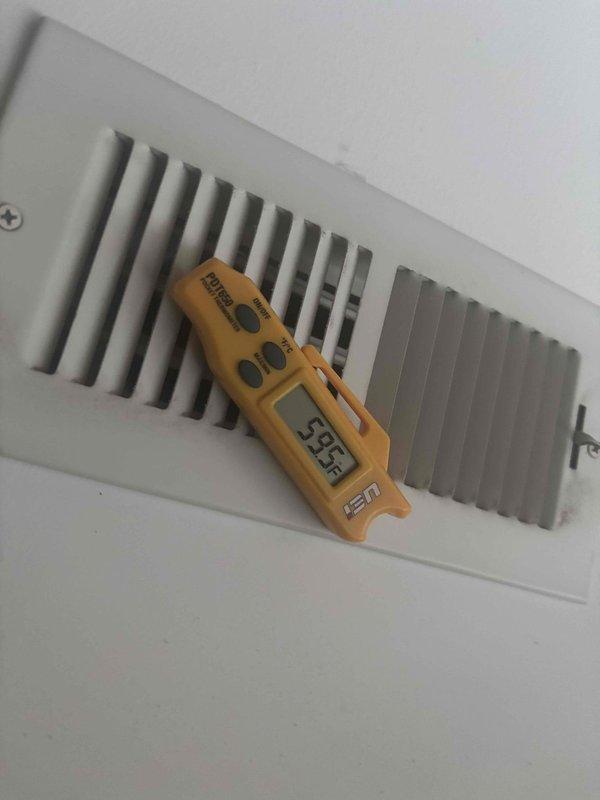 Responded to complaint of upstairs HVAC unit blowing warm air instead of cooling. Upon arrival, instructed homeowner to power down the system to prevent further issues. Performed diagnostic inspection of recently installed upstairs unit, checking thermostat operation and airflow at supply registers. Measured supply air temperature at ceiling vent register reading 385°F, confirming warm air discharge. Documented thermostat display and vent conditions with photos for warranty evaluation purposes.