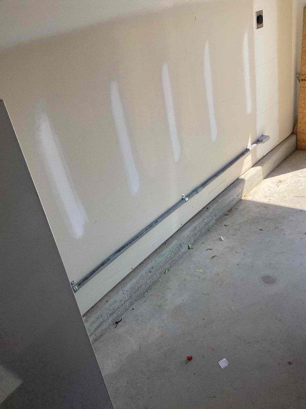 Installed a dedicated 240V circuit and outlet in the garage for an EV charger. Ran new wiring from the electrical panel located in the garage to the outlet location, installed appropriate circuit breaker, and mounted the 240V receptacle to accommodate the customer's existing plug-in EV charging equipment. All work completed to code specifications with proper circuit labeling in the panel.