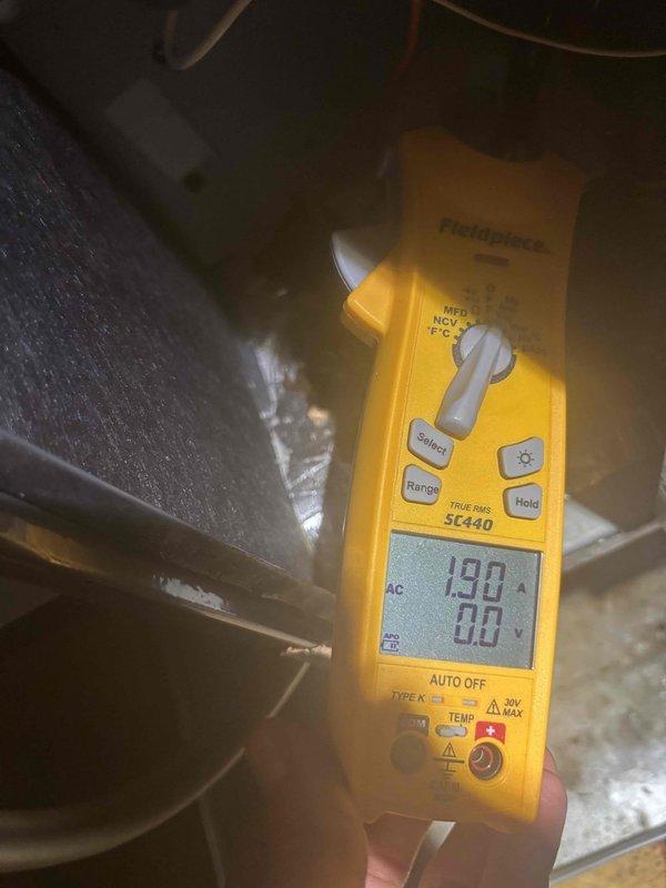 Responded to no-cool condition on lower level split system unit while upper level system operated normally. Upon arrival, found thermostat displaying communication error message indicating failure to call lower level air conditioning unit. Performed diagnostic testing using clamp meter, measuring 190 amps at the equipment, indicating potential electrical issue or compressor problem. Inspected condensate drain system and verified proper operation of drain pump assembly and PVC drainage piping. Checked wiring connections at junction box and verified all electrical terminations were secure. System restored to normal operation with both zones functioning properly.