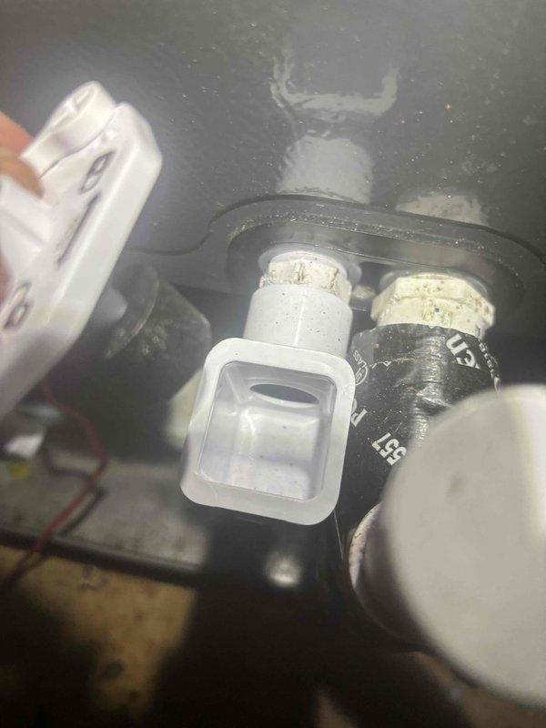 Responded to no-cool condition on lower level split system unit while upper level system operated normally. Upon arrival, found thermostat displaying communication error message indicating failure to call lower level air conditioning unit. Performed diagnostic testing using clamp meter, measuring 190 amps at the equipment, indicating potential electrical issue or compressor problem. Inspected condensate drain system and verified proper operation of drain pump assembly and PVC drainage piping. Checked wiring connections at junction box and verified all electrical terminations were secure. System restored to normal operation with both zones functioning properly.