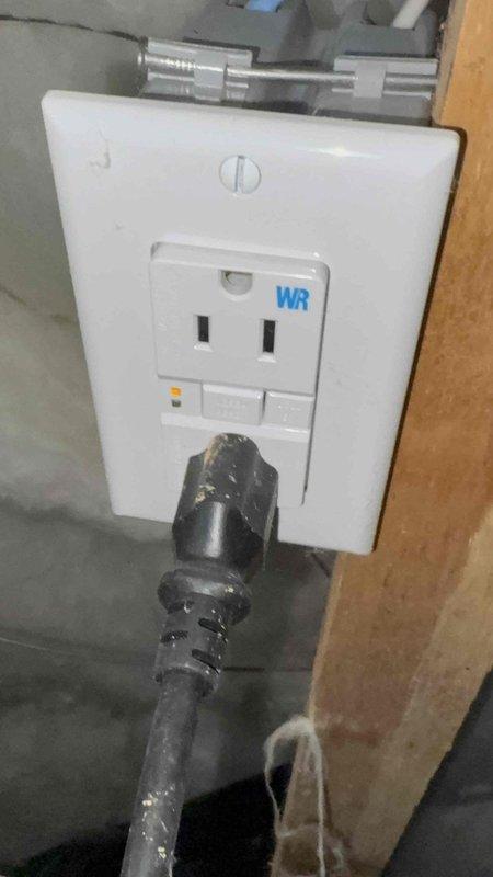 Responded to no cooling complaint on 7-year-old residential air conditioning system. Upon inspection, found condensate safety switch tripped due to clogged drain line, preventing system operation. Cleared blockage from condensate drain, tested switch functionality, and verified proper drainage. Reset safety switch, confirmed system startup, and monitored unit through complete cooling cycle to ensure proper operation and adequate airflow.