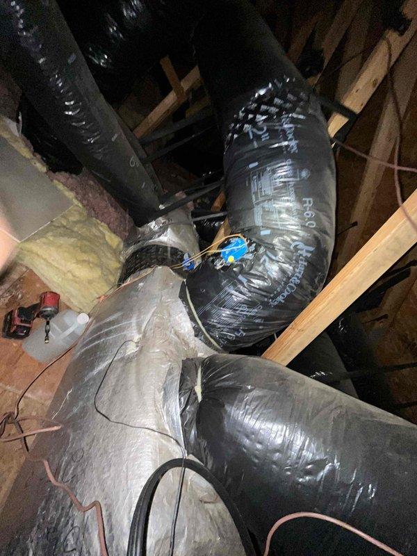 Completed comprehensive heating and air maintenance on 2021 HVAC system including 80-point inspection, outdoor coil cleaning, burner cleaning, and gas pressure adjustments. Verified all safety systems operational and confirmed electrical readings within manufacturer specifications at 129.7V. Inspected attic ductwork installation and verified proper support and insulation integrity throughout system.