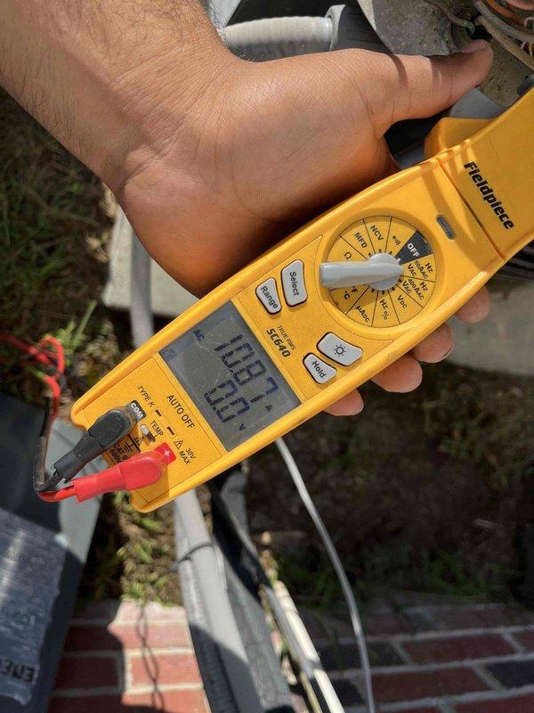 Completed comprehensive heating and air maintenance on 2021 HVAC system including 80-point inspection, outdoor coil cleaning, burner cleaning, and gas pressure adjustments. Verified all safety systems operational and confirmed electrical readings within manufacturer specifications at 129.7V. Inspected attic ductwork installation and verified proper support and insulation integrity throughout system.