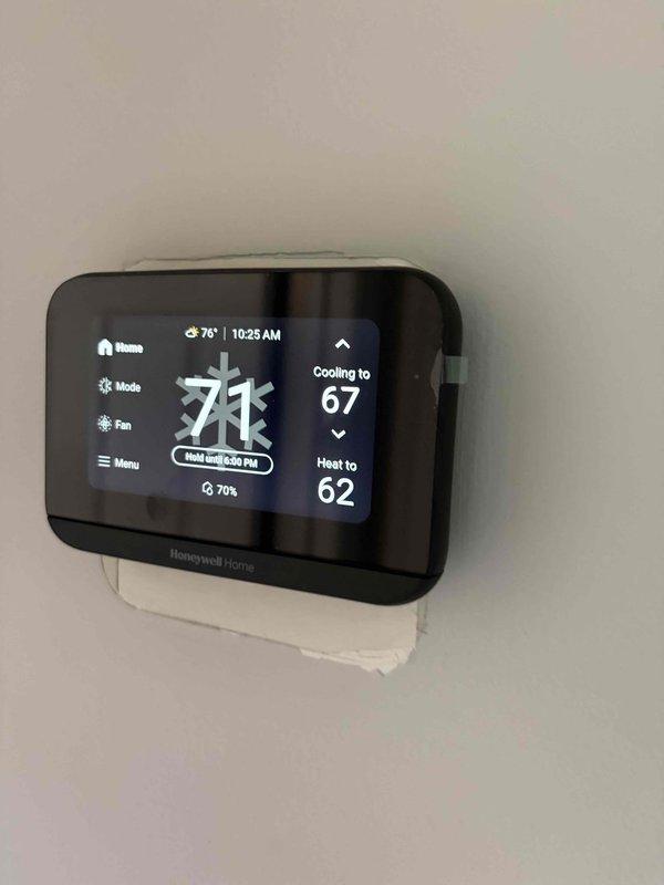 Completed comprehensive heating and air maintenance on 2015 system including 80-point inspection, outdoor coil cleaning, burner cleaning, gas pressure adjustments, and full safety inspection. Installed customer-provided Honeywell Home smart thermostat, programmed unit to cooling mode with hold settings, and verified proper operation. All equipment tested and operating within manufacturer specifications upon completion.